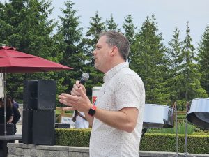 MP Holland addresses crowd at Ajax Community BBQ 2023