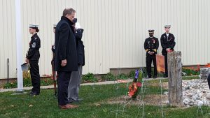 MP Mark Holland pays his respects in front of a wreath at the Ajax Legion on Remembrance Day
