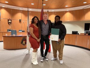 MP Mark Holland poses with new Canadian citizens in Ajax