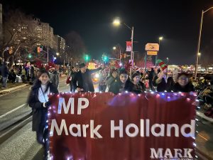 MP Mark Holland and his Office staff walking in the 2022 Ajax Santa Claus Parade